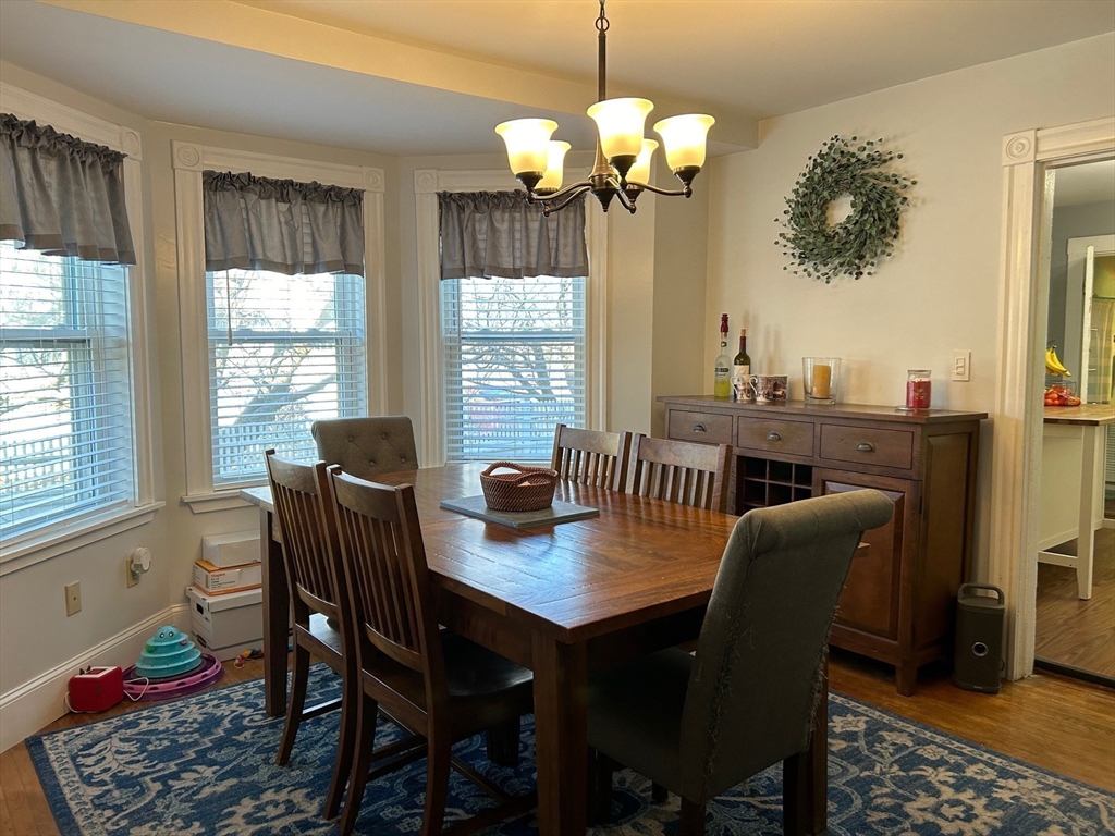 30 Parker Street Lexington, MA 02421 - Photo 4 of 11 a view of a dining room with furniture window and outside view