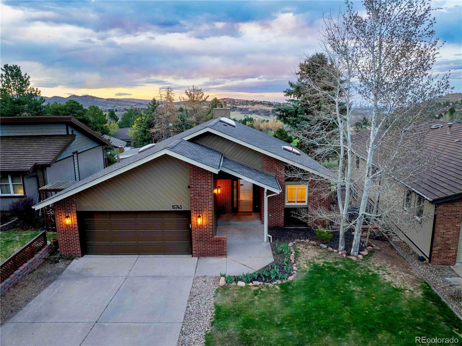 15743 Wedge Way Morrison, CO 80465 - Photo 1 of 48 a house view with a outdoor space