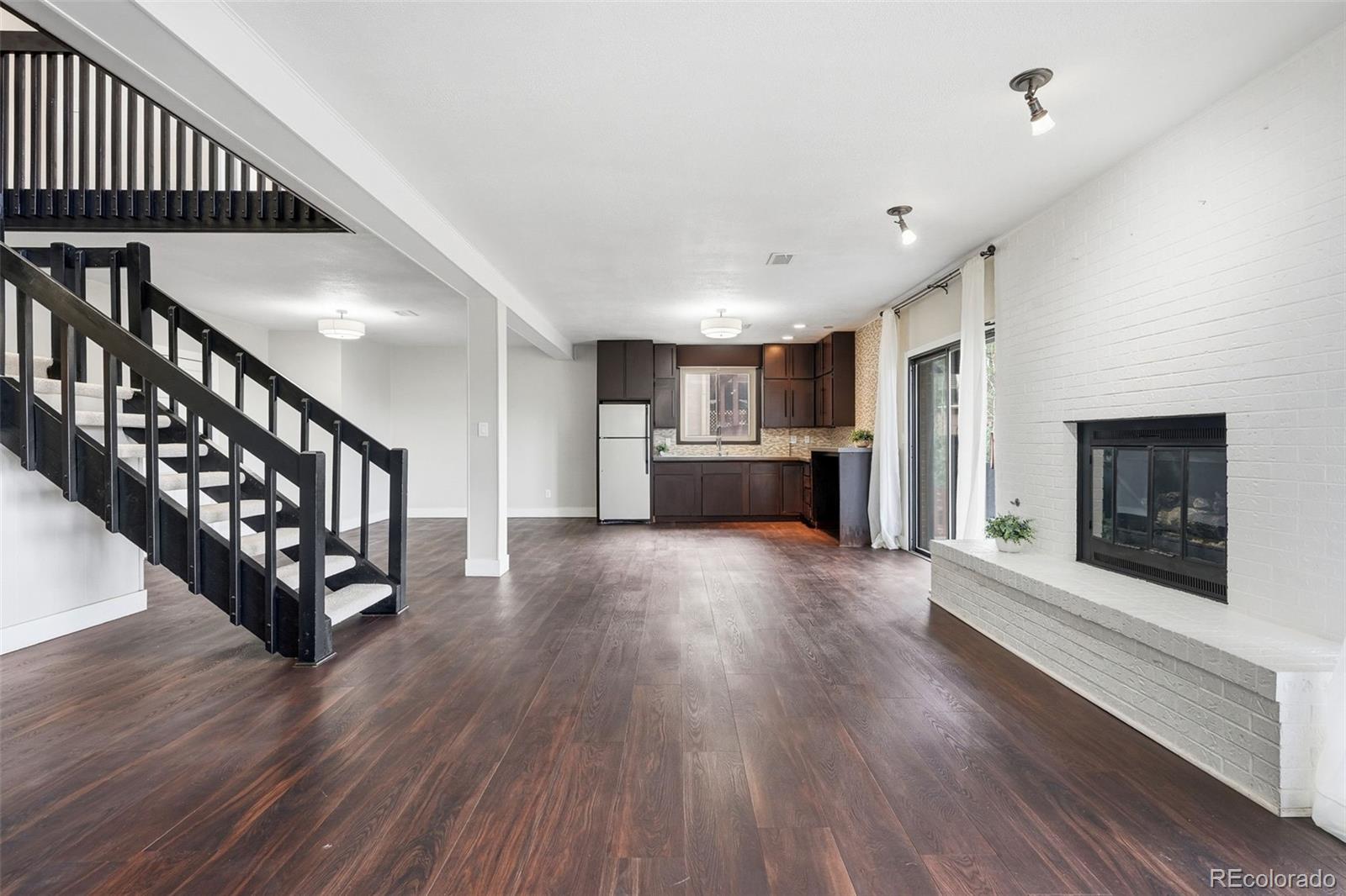 15743 Wedge Way Morrison, CO 80465 - Photo 31 of 48 a view of an entryway with wooden floor