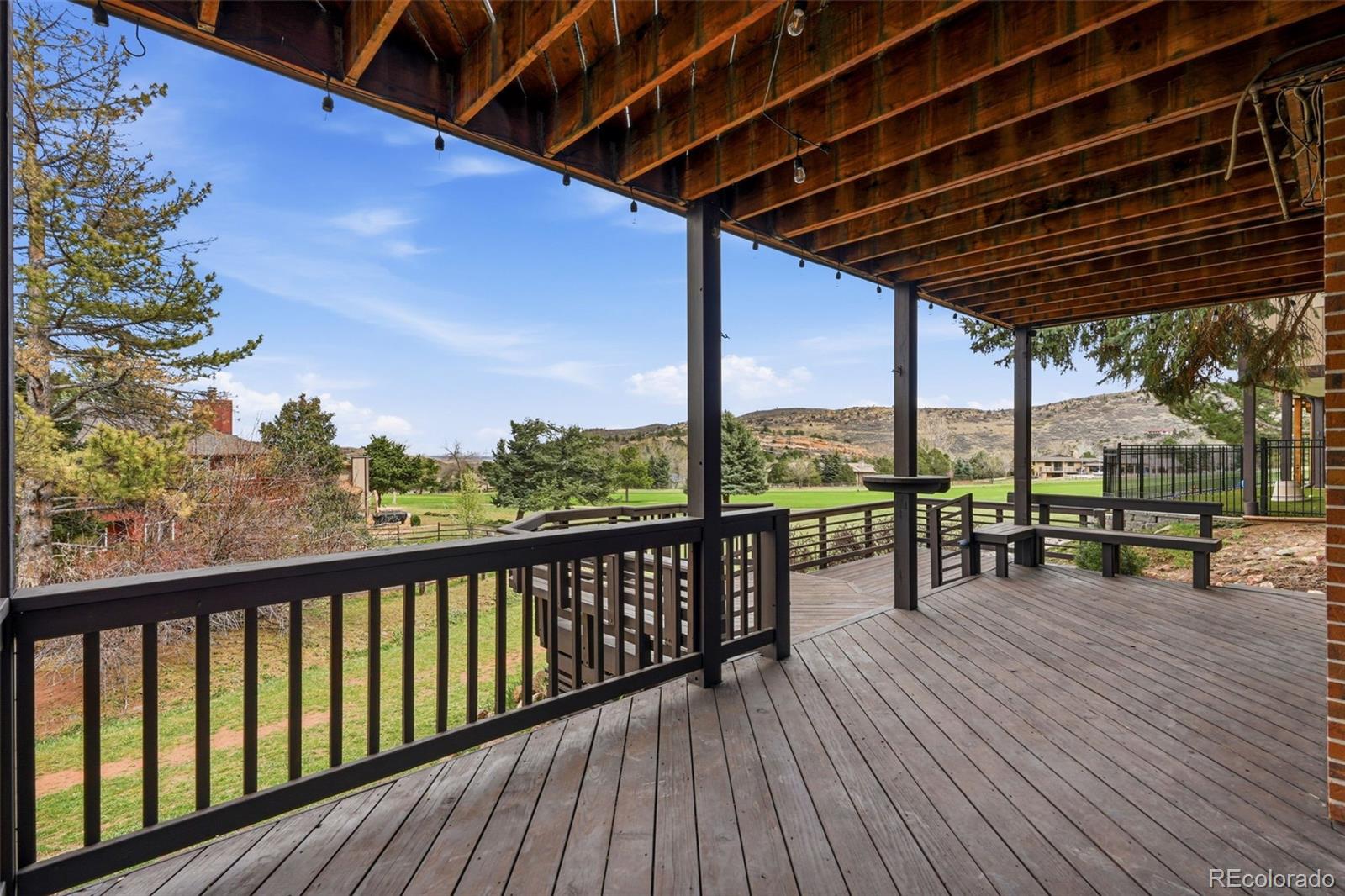 15743 Wedge Way Morrison, CO 80465 - Photo 40 of 48 a view of chairs on the deck
