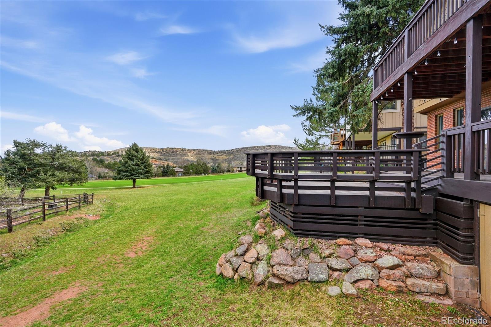 15743 Wedge Way Morrison, CO 80465 - Photo 42 of 48 a view of a yard with wooden fence