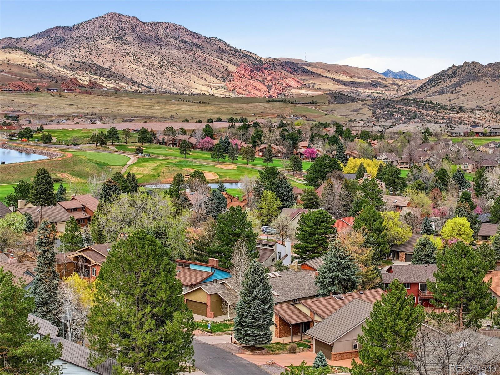 15743 Wedge Way Morrison, CO 80465 - Photo 46 of 48 an aerial view of residential houses with outdoor space and trees