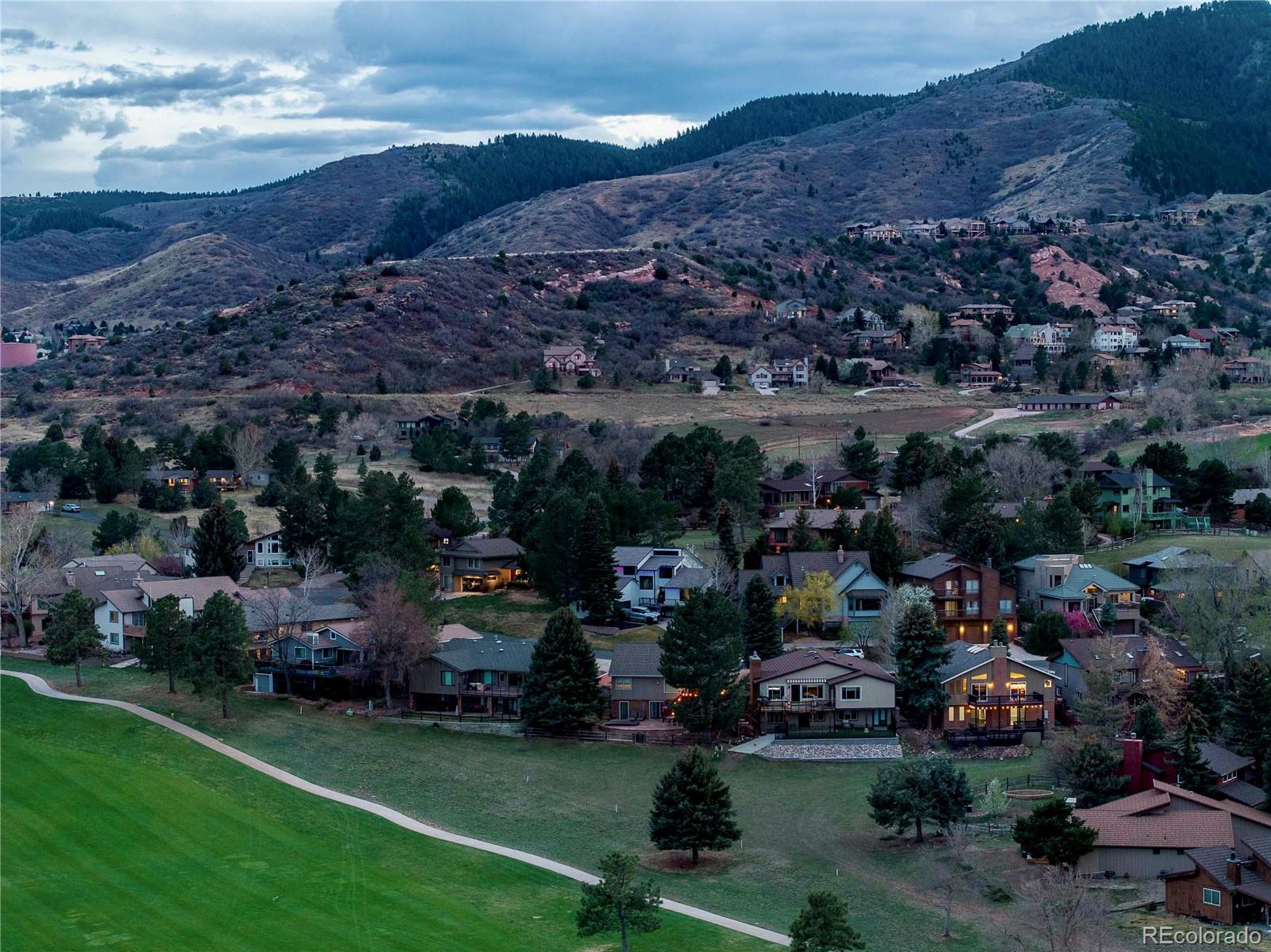15743 Wedge Way Morrison, CO 80465 - Photo 47 of 48 a view of a town with mountains in the background