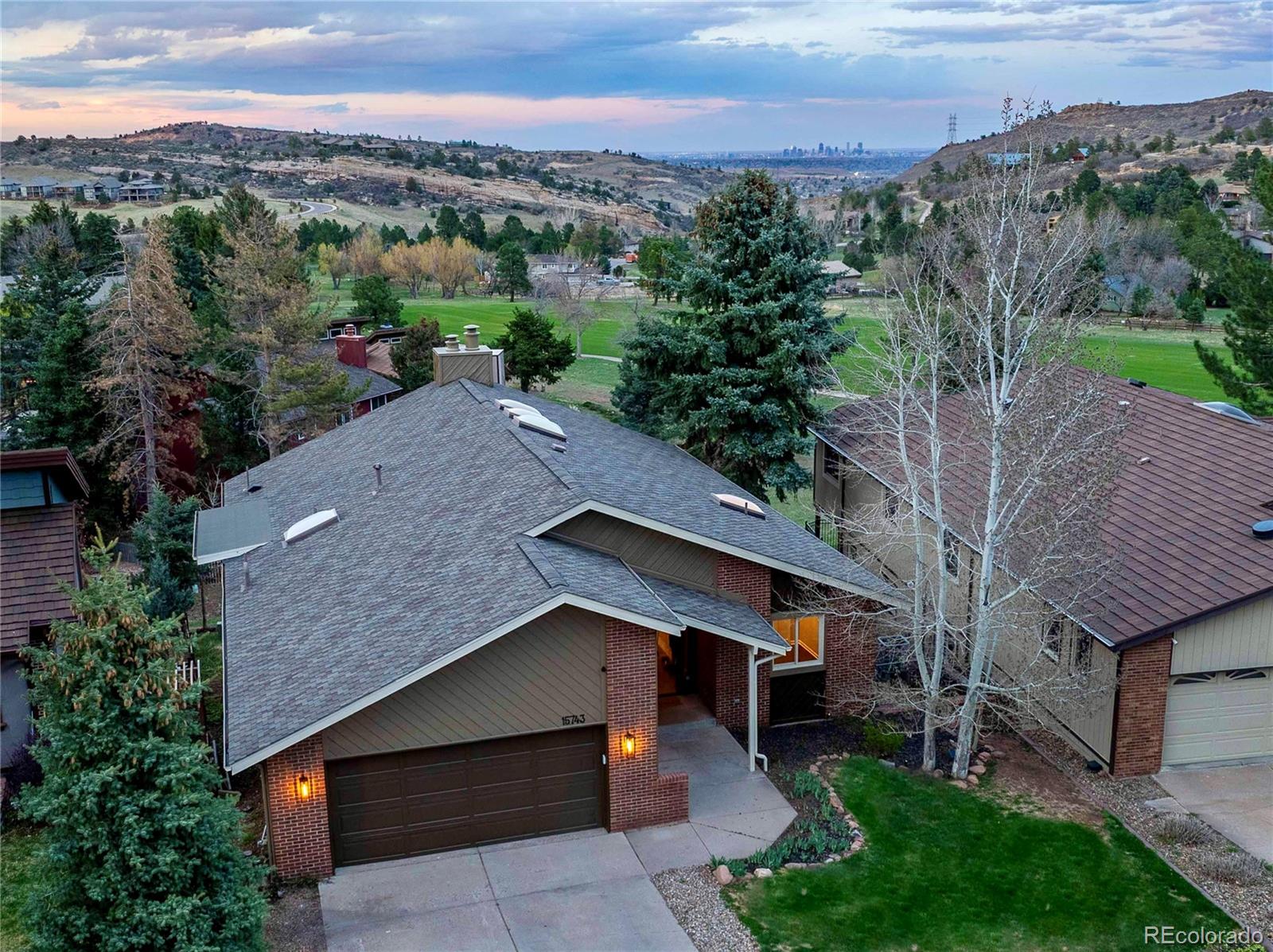 15743 Wedge Way Morrison, CO 80465 - Photo 48 of 48 an aerial view of a house with a yard