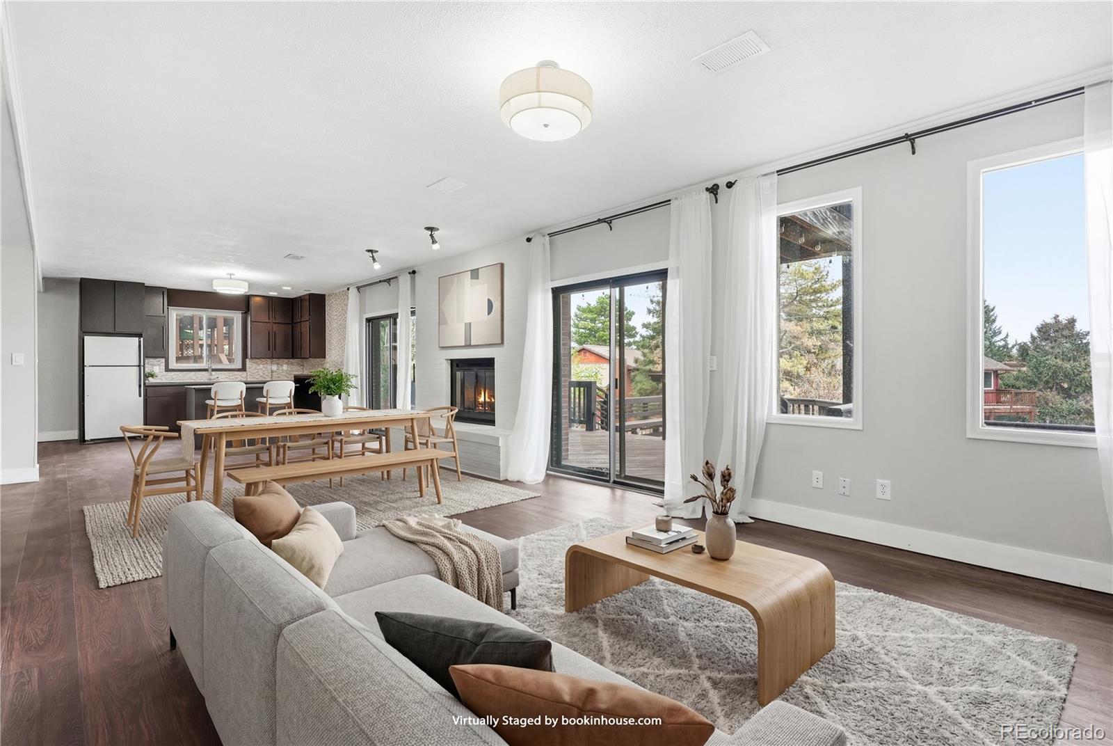 15743 Wedge Way Morrison, CO 80465 - Photo 5 of 48 a living room with furniture and a large window