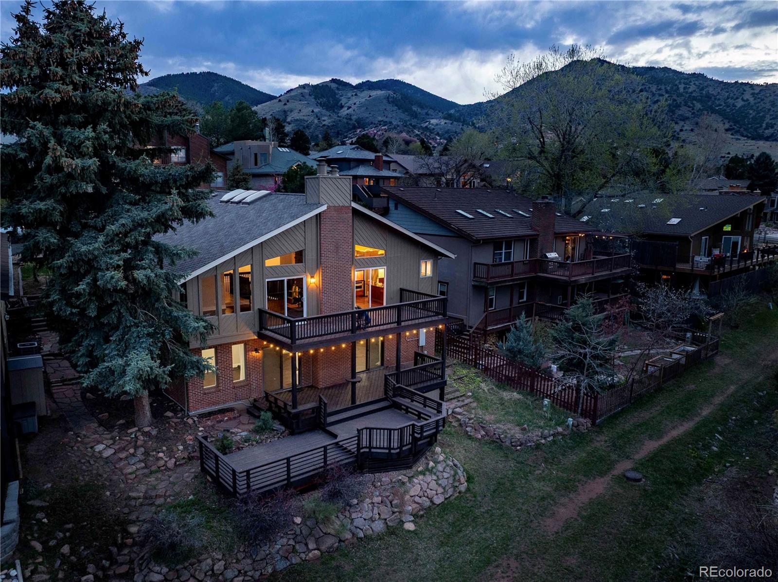 15743 Wedge Way Morrison, CO 80465 - Photo 6 of 48 a view of a house with a yard