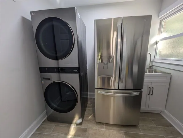 a utility room with dryer and washer