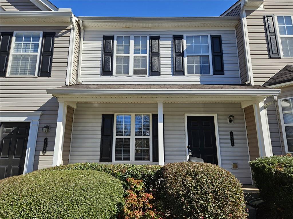 6583 Arbor Gate Drive Southwest, Unit 10 Mableton, GA 30126 - Photo 1 of 6 front view of a brick house with a large windows