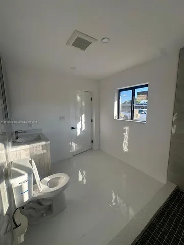 a view of a room with windows