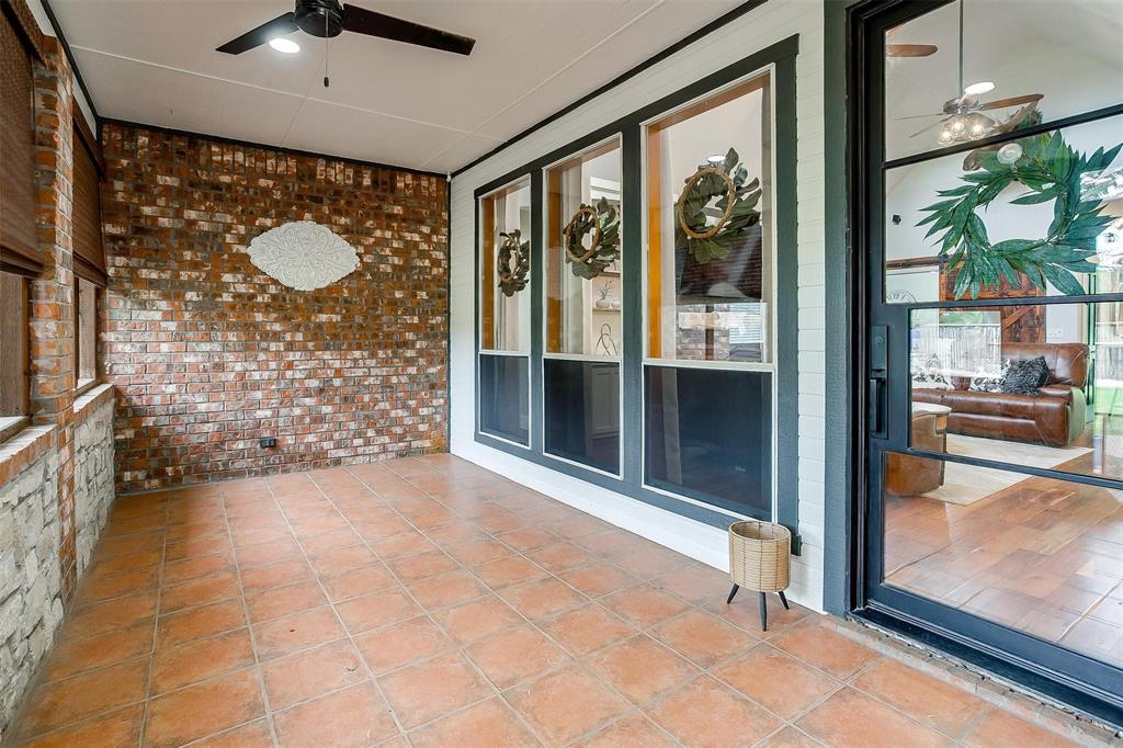 4962 Farm To Market 113 Millsap, TX 76066 - Photo 16 of 36 a view of a glass door with a door