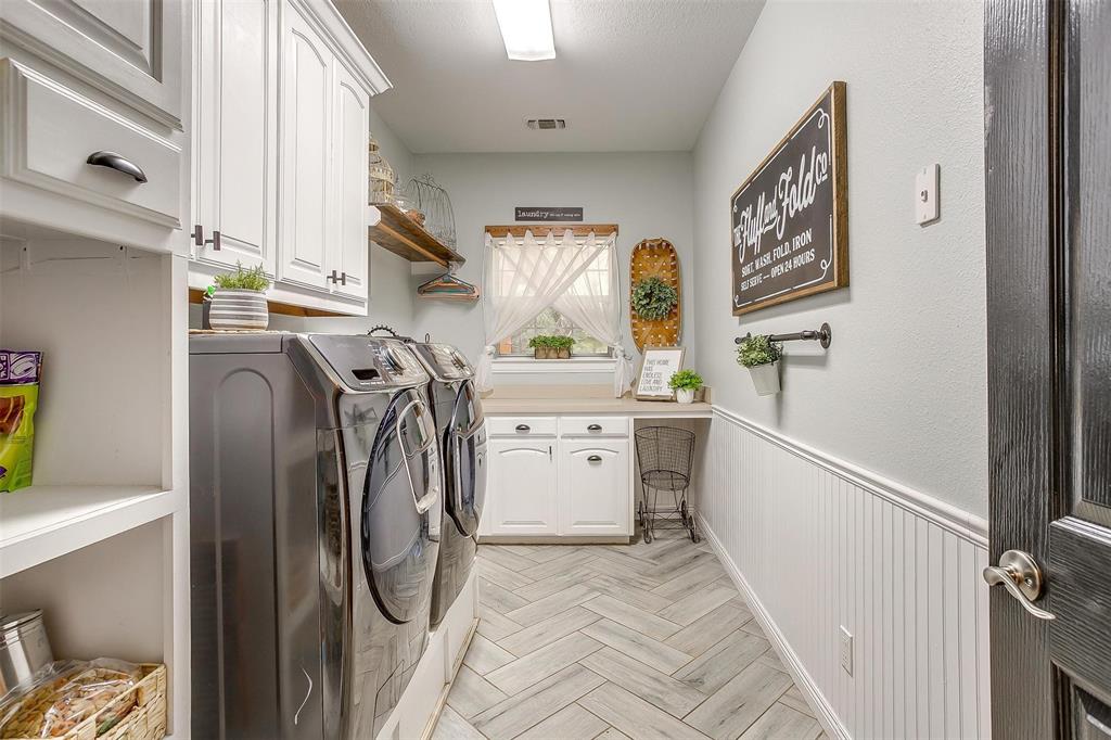 4962 Farm To Market 113 Millsap, TX 76066 - Photo 22 of 36 a utility room with dryer and washer