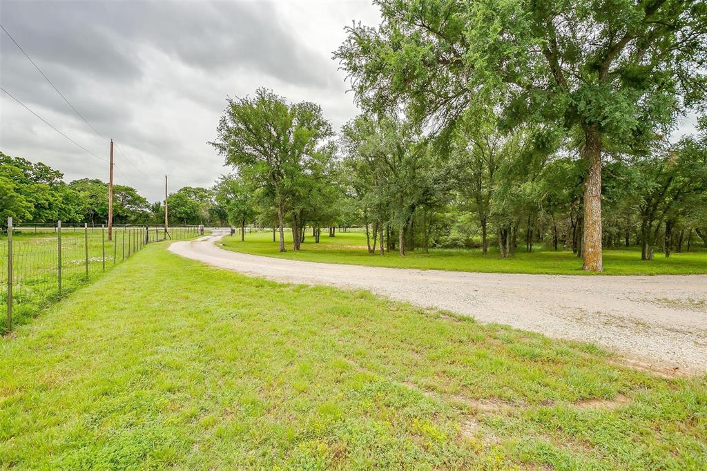 4962 Farm To Market 113 Millsap, TX 76066 - Photo 6 of 36 a view of a park with large trees