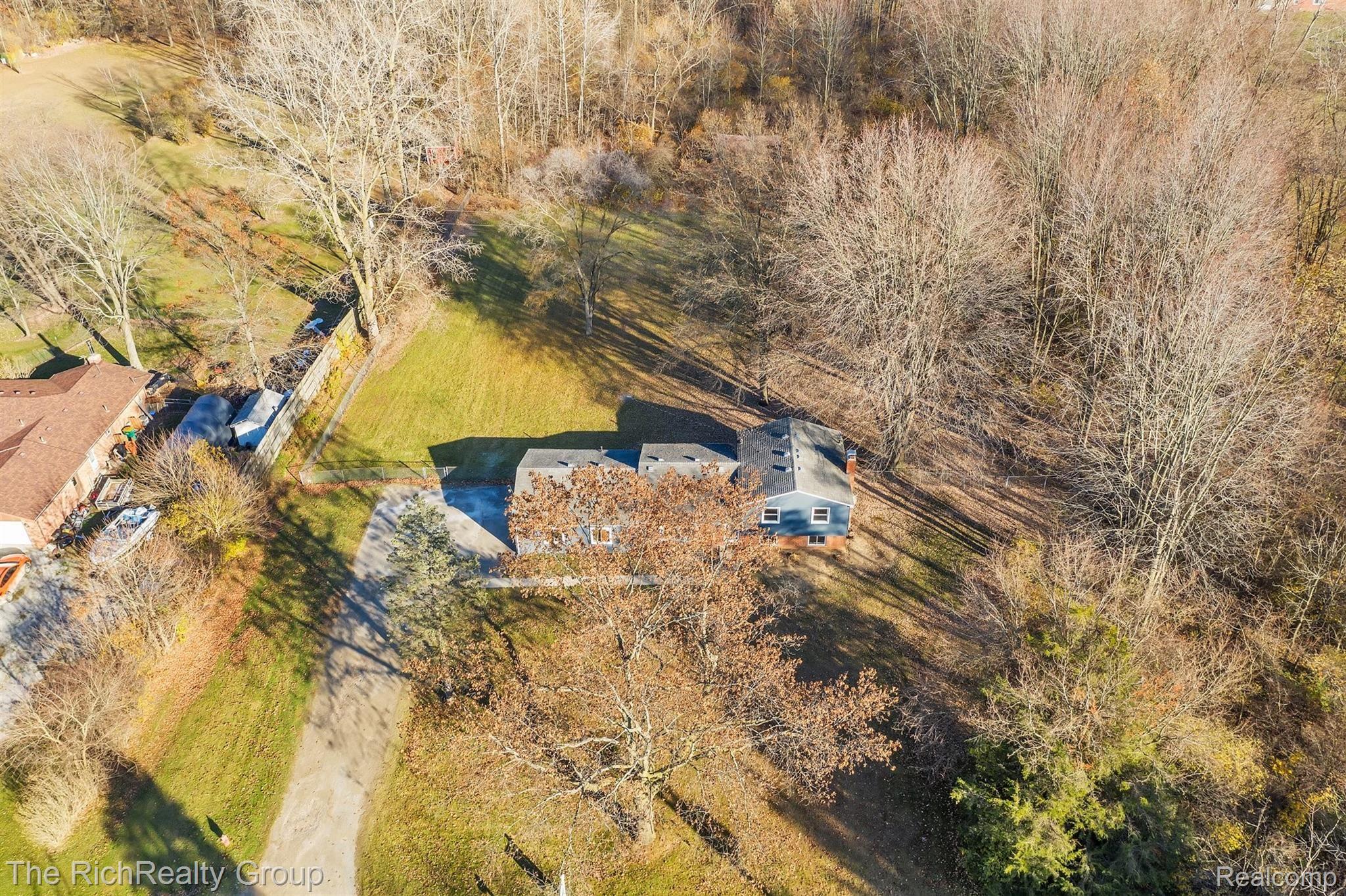 22701 Dickinson Road New Boston, MI 48164 - Photo 39 of 43 49-22701 Dickinson Rd-WindowStill-R.jpg