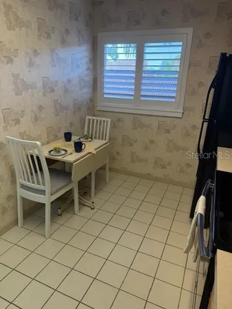 a bathroom with a sink and a shower