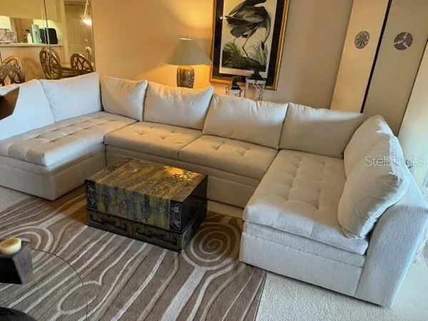 a view of a couch in a living room with a couch