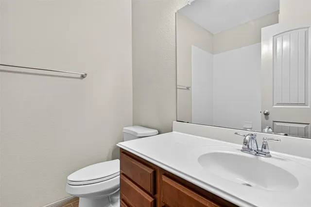 a bathroom with a sink and a toilet