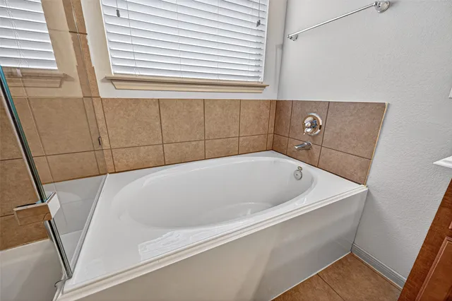 a bathroom with a bathtub