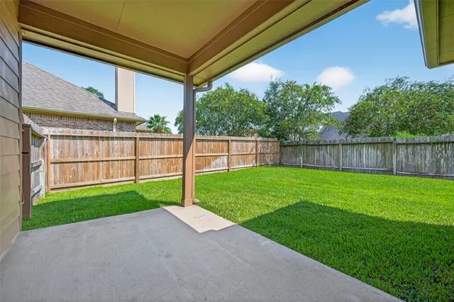 a view of a backyard with a garden