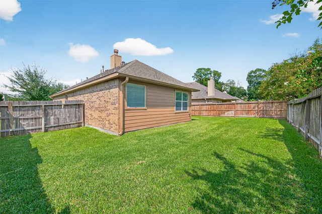 a view of a backyard with a garden