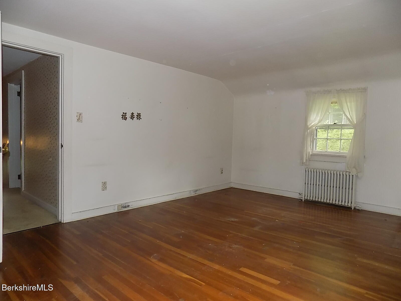 350 Laurel Street Lee, MA 01238 - Photo 15 of 34 an empty room with wooden floor and windows
