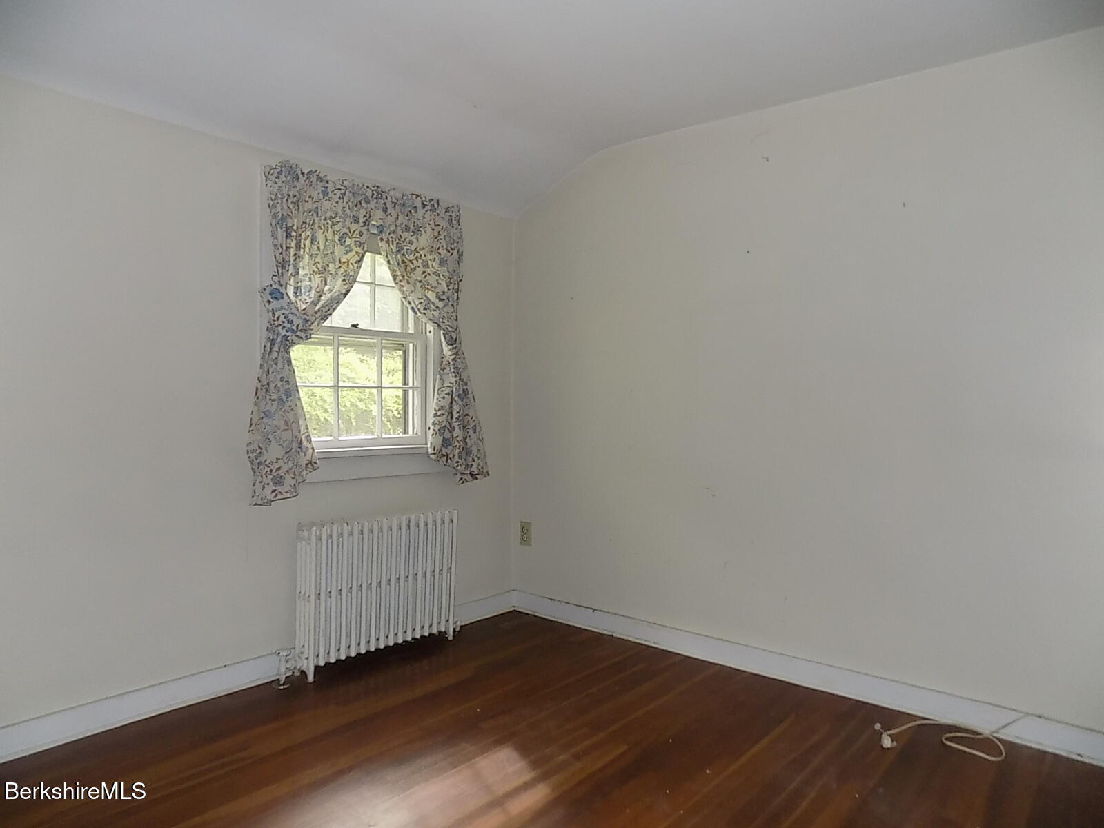 350 Laurel Street Lee, MA 01238 - Photo 16 of 34 an empty room with wooden floor and windows