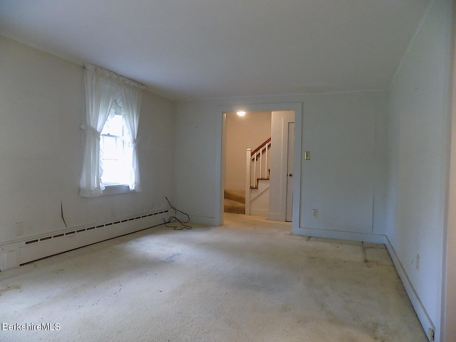 350 Laurel Street Lee, MA 01238 - Photo 4 of 34 an empty room with windows and entrance
