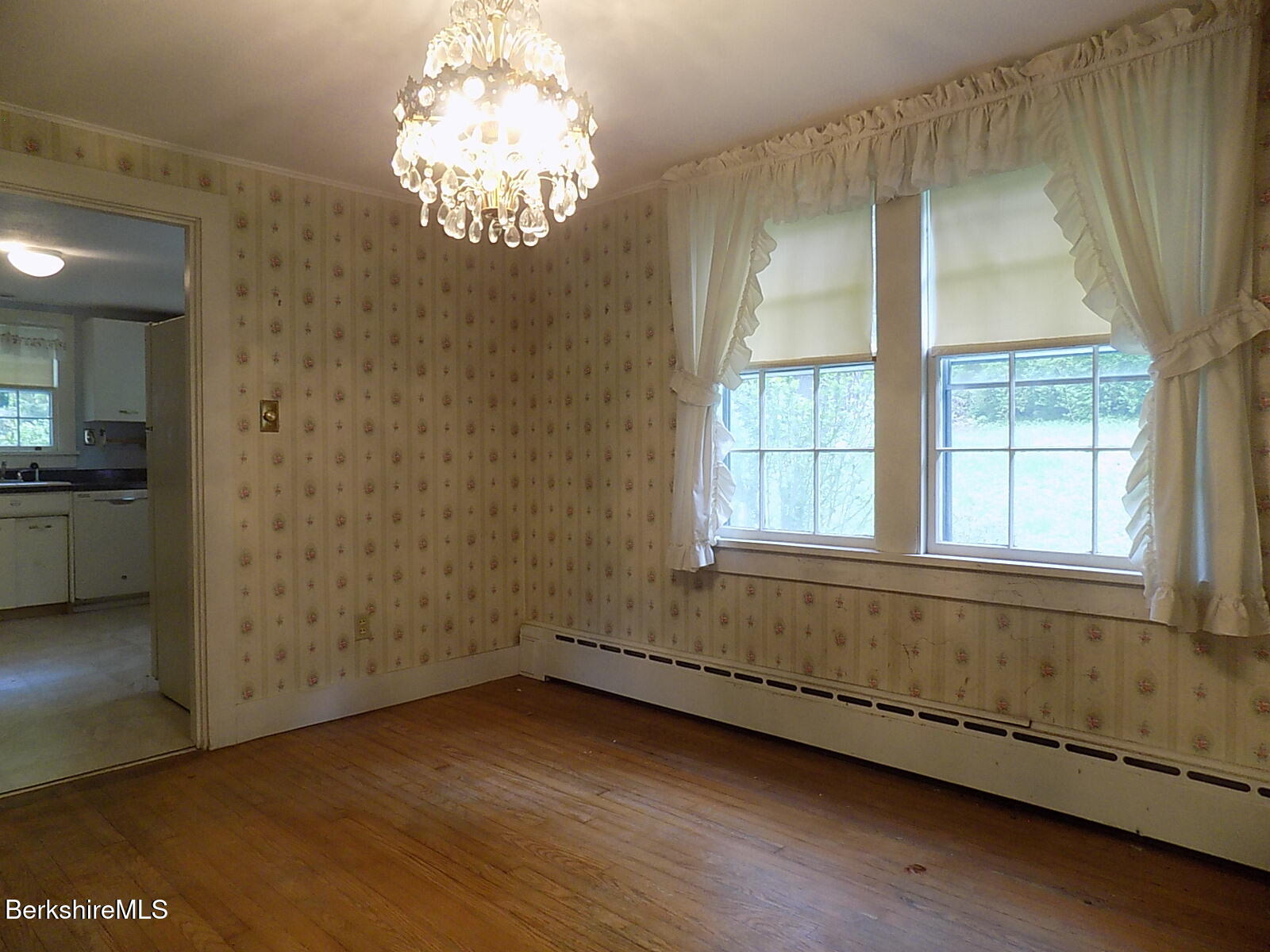 350 Laurel Street Lee, MA 01238 - Photo 5 of 34 an empty room with wooden floor and windows