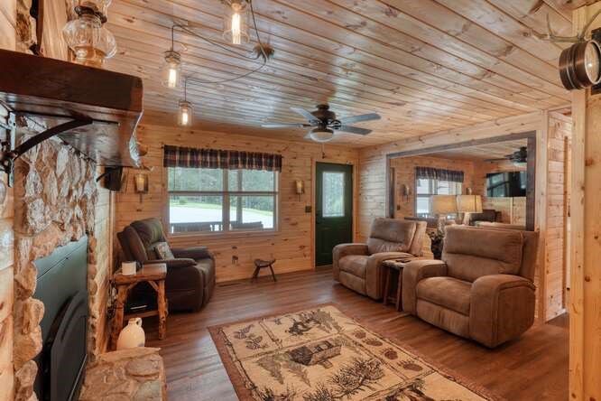 245 Panther Hill Road Murphy, NC 28906 - Photo 16 of 57 a living room with furniture and a window