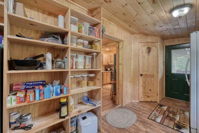 245 Panther Hill Road Murphy, NC 28906 - Photo 33 of 57 a room with furniture and a book shelf