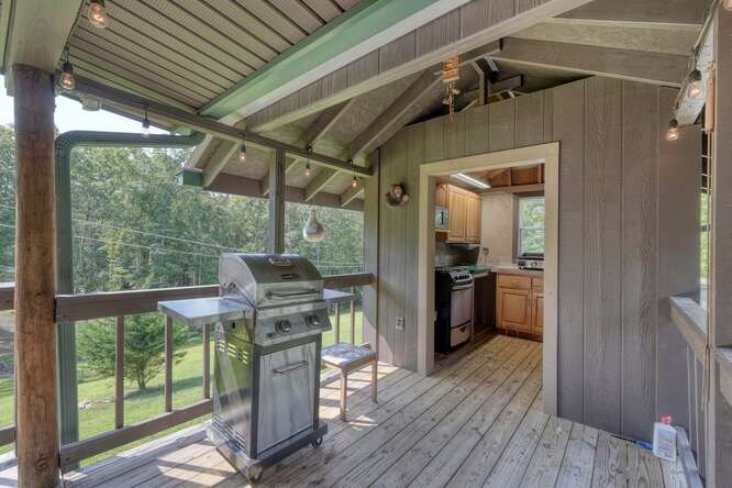 245 Panther Hill Road Murphy, NC 28906 - Photo 36 of 57 a view of a kitchen with a stove wooden floor and a kitchen