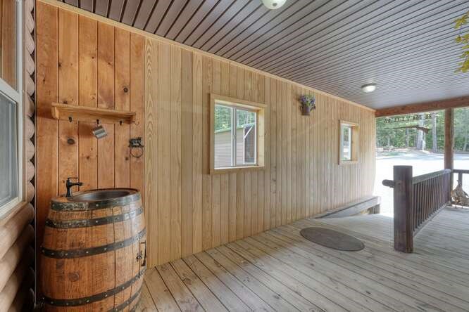 245 Panther Hill Road Murphy, NC 28906 - Photo 39 of 57 a room with wooden floor and furniture