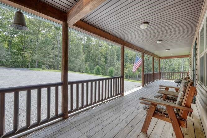 245 Panther Hill Road Murphy, NC 28906 - Photo 40 of 57 a view of a two chairs in the balcony