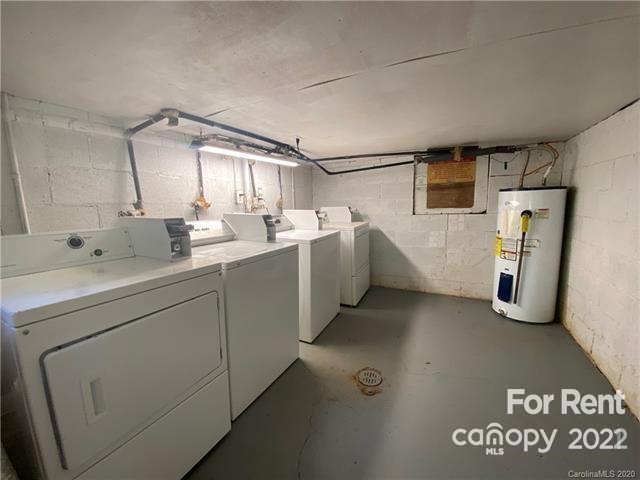 4226 Castleton Road Charlotte, NC 28211 - Photo 12 of 14 a utility room with dryer and washer