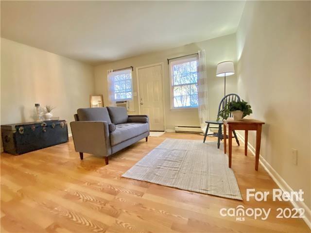 4226 Castleton Road Charlotte, NC 28211 - Photo 14 of 14 a living room with furniture and a table