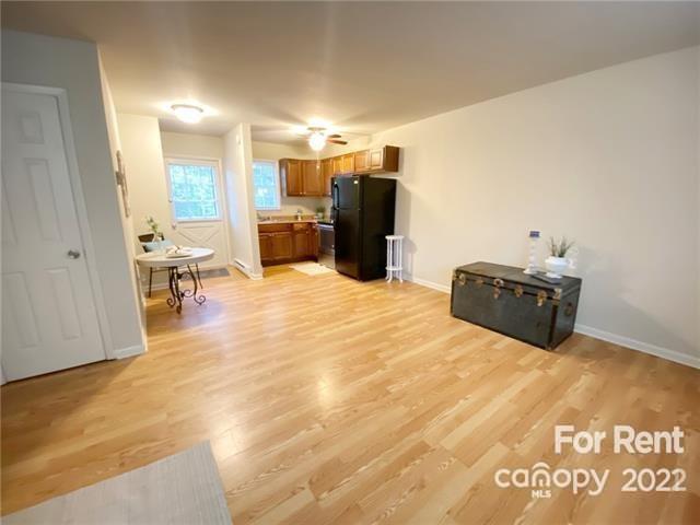 4226 Castleton Road Charlotte, NC 28211 - Photo 3 of 14 a large room with a table and chairs