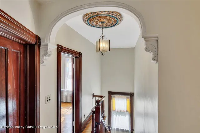 a view of a room with a large window