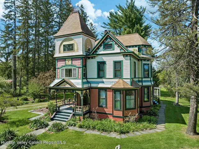 a view of field with trees in the background