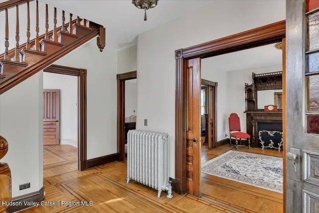 a view of a livingroom with furniture and front door