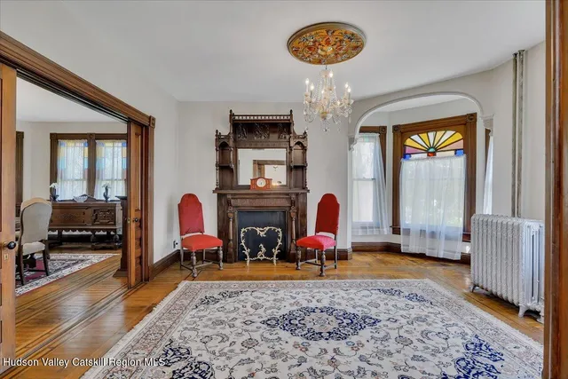 a view of a livingroom with furniture and a window
