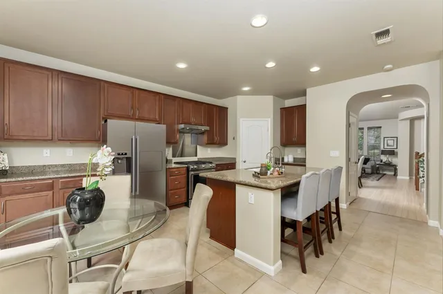a view of a living room with granite countertop
