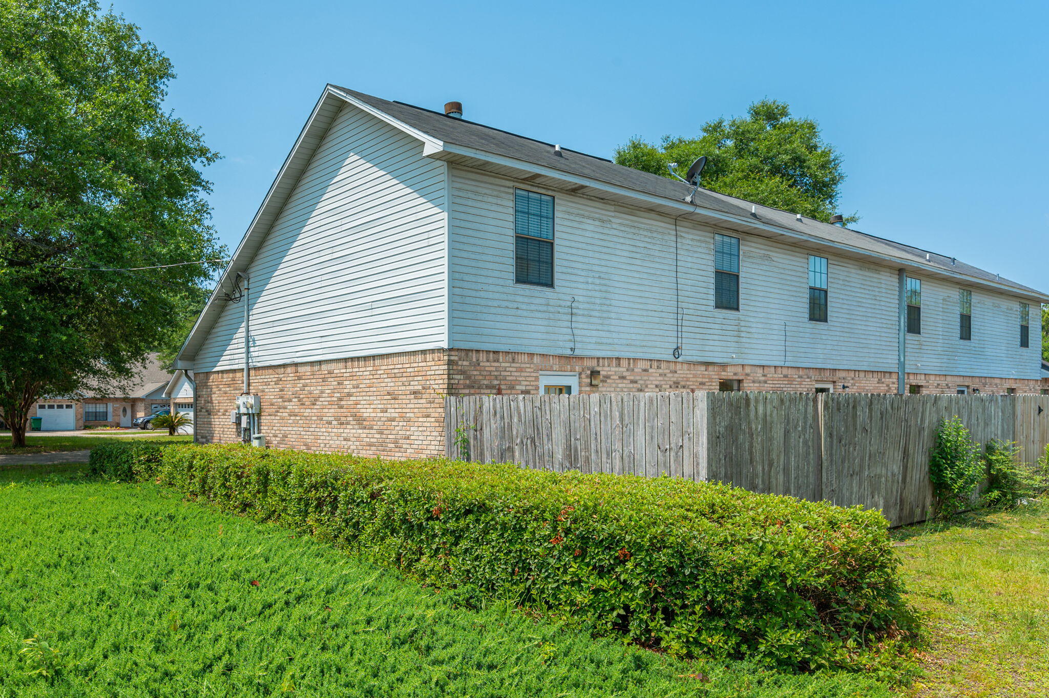 811 Valley Road Crestview, FL 32539 - Photo 24 of 26 a front view of house with backyard and green space