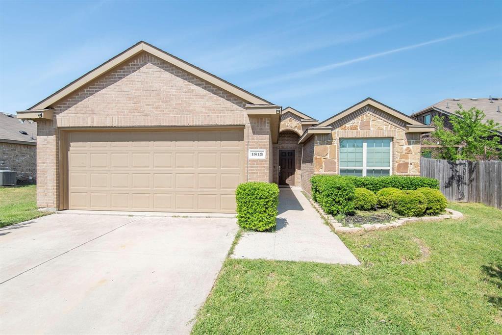 1813 Rodeo Drive Anna, TX 75409 - Photo 1 of 6 a front view of a house with a yard