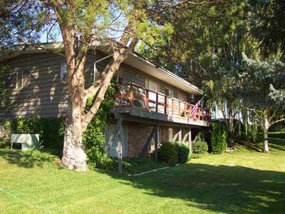 113 Sand Hill Road Grandview, WA 98930 - Photo 20 of 24 a view of a house with a big yard