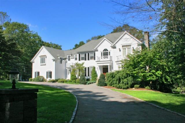 50 Cattle Pen Lane Ridgefield, CT 06877 - Photo 1 of 1 a front view of a house with a yard
