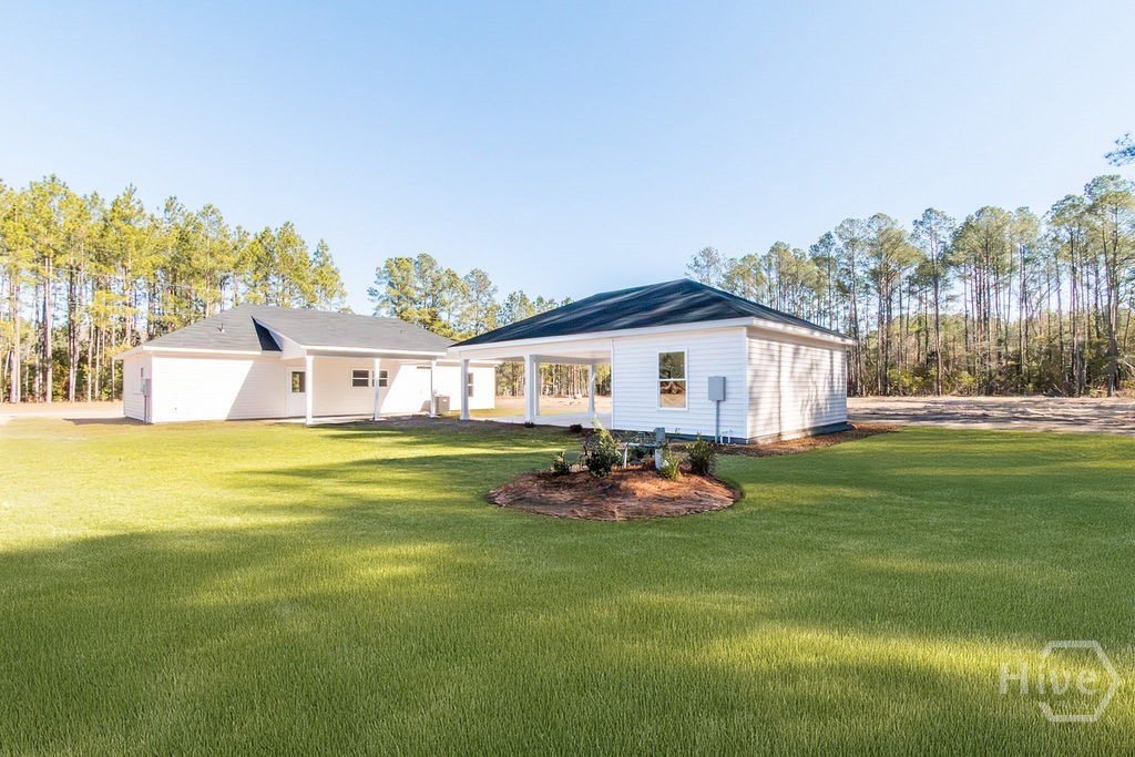 1347 Old Tusculum Road Springfield, GA 31329 - Photo 31 of 32 Back Yard View *Grass enhanced for photos*