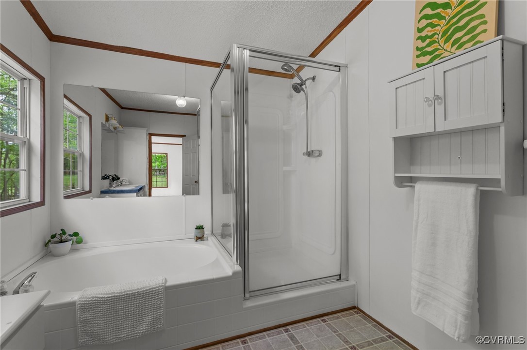 55 Redd Shop Road Farmville, VA 23901 - Photo 26 of 37 a bathroom with a bathtub and a shower