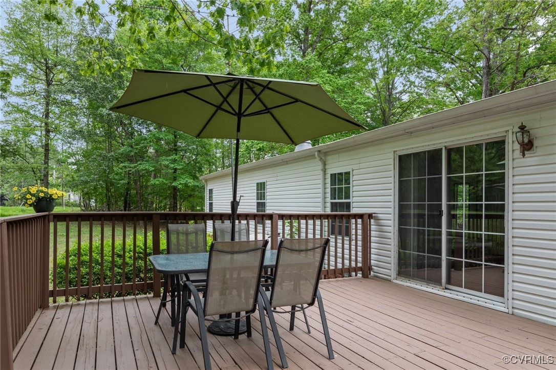 55 Redd Shop Road Farmville, VA 23901 - Photo 6 of 37 a view of deck with furniture and umbrella