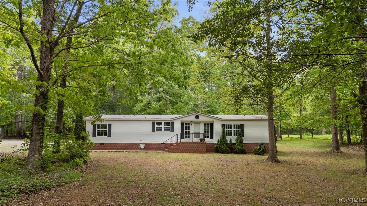 55 Redd Shop Road Farmville, VA 23901 - Photo 7 of 37 front view of a house with a patio