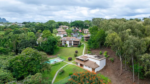 a view of a house with a garden