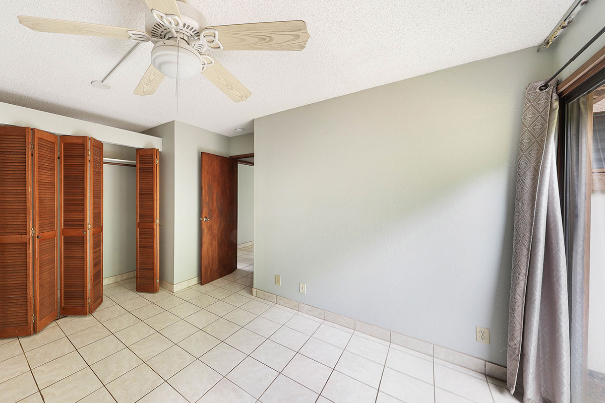 4701 Kawaihau Road, Unit A101 Kapaa, HI 96746 - Photo 4 of 25 a view of room with window and chandelier